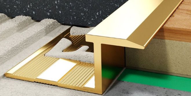 Аккуратная и долговечная стыковка разнородных покрытий – задача, с которой отлично справляется латунный профиль